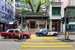 Hong Kong,March 25,2019 exterior view of the small Hung Shing Temple located in Wan Chai, Hong Kong during a cloudy day photo