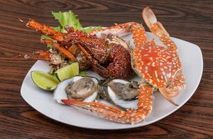 Spiny lobster, crab and oyster photo