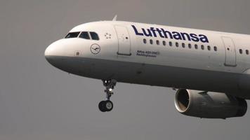 FRANKFURT AM MAIN, GERMANY   JULY 19, 2017 - Civil airplane of Lufthansa descending for landing at Frankfurt Airport. Tourism and travel concept, air flight video