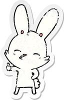 distressed sticker of a curious bunny cartoon vector