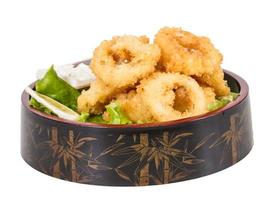 Deep batter fried squid rings calamari with green salad photo