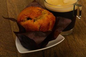 Muffin with espresso photo