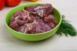 Raw marinated meat for bbq photo