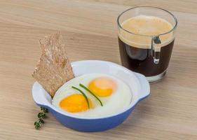 Breakfast with eggs and coffee photo