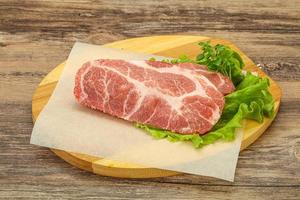 Raw pork meat neck steack photo