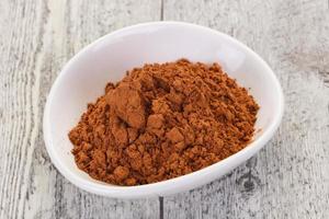 Cocoa powder in the bowl photo