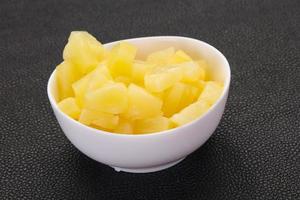 Marinated pineapple pieces photo