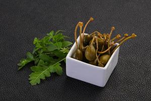 Pickled Capersberries in the bowl photo