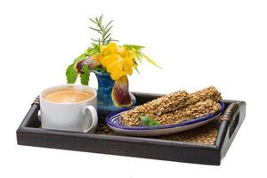 Breakfast wirh coffee and sunflower seeds dessert photo