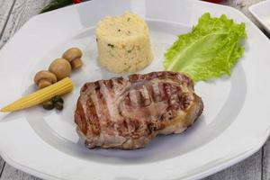 Grilled pork neck steak photo