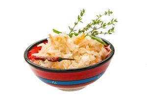 Fermented cabbage in dish photo