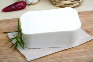 Feta cheese on wood photo