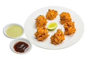 Onion bhajee on white background photo