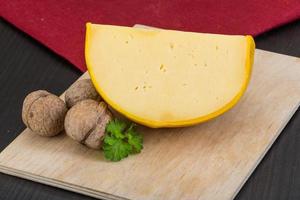 Yellow round cheese photo