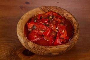 Pickled bell pepper with herbs photo