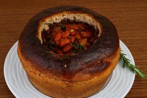 Bean soup in bread photo