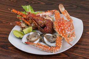 Spiny lobster, crab and oyster photo
