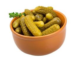Marinated cucumbers, pickles in a bowl photo