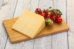 Hard parmesan cheese piece photo