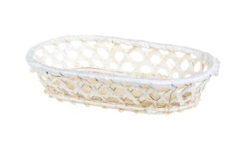 Wickerwork empty yellow breadbasket on white background photo