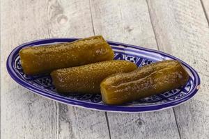 Pickled homemade cucumbers photo