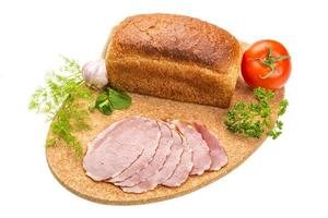 Ripe fresh ham with vegetables photo