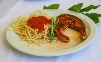 Grilled salmon with pasta photo