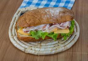 Ciabatta with cheese and bacon photo