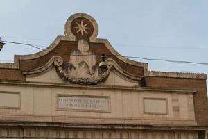 Rome, Italy. Famous Porta del Popolo city gate. photo