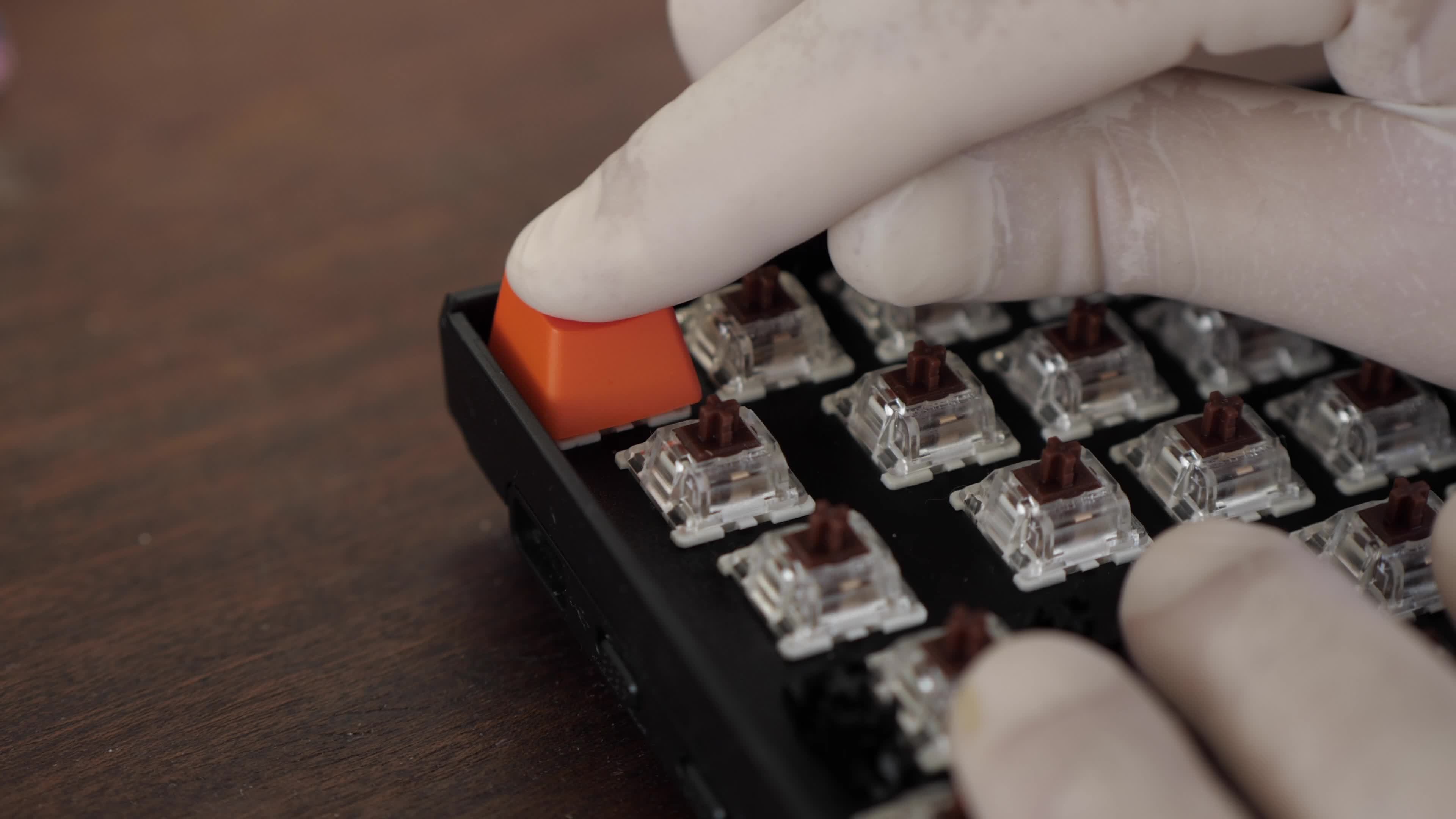 Assembling a mechanical keyboard on brown switches. clicking sounds 8478545 Stock Video at Vecteezy