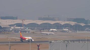 HONG KONG   NOVEMBER 10, 2019 - Airbus A330 of Hong Kong Airlines takes off at Hong Kong Airlines. Tourism and travel concept video