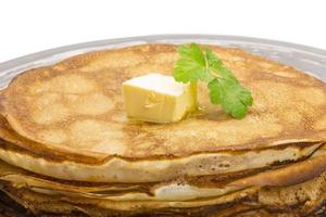 Russian pancakes on white photo