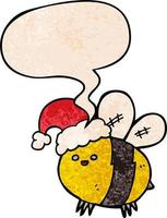 linda abeja de dibujos animados con sombrero de navidad y burbuja de habla en estilo de textura retro vector