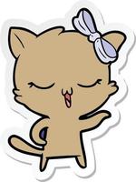 sticker of a cartoon cat with bow on head vector