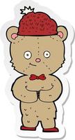 sticker of a cartoon bear in hat vector