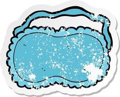 retro distressed sticker of a cartoon sleeping mask vector