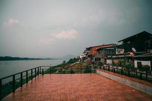 Chiang Khan Loei Thailand Landscape Wooden House Riverside with sunset on evening time at Chaing Khan old town Loei Thailand photo