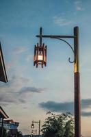 vintage old lamp at dusk, Sunset lamp, blue sky photo