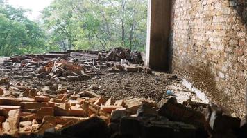 Close-up of the rubble of an industrial building collapsing into a pile of concrete and brick. and the jagged debris caused by the failure of the engineers at the abandoned construction. photo