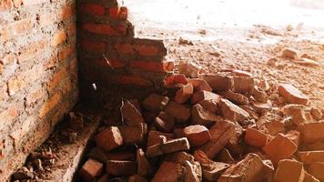 Close-up of the rubble of an industrial building collapsing into a pile of concrete and brick. and the jagged debris caused by the failure of the engineers at the abandoned construction. photo