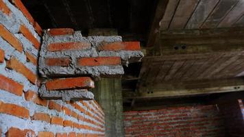 Close-up of the rubble of an industrial building collapsing into a pile of concrete and brick. and the jagged debris caused by the failure of the engineers at the abandoned construction. photo