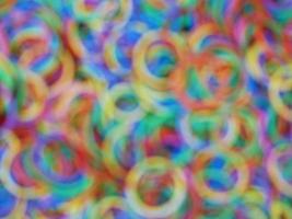 Multiple circles of rainbow bokeh photo. photo
