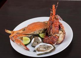 Spiny lobster, crab and oyster photo