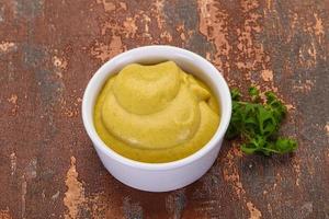 Mustard sauce in the bowl photo