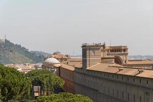 Buildings in Vatican, the Holy See within Rome, Italy. Part of Saint Peter's Basilica. photo