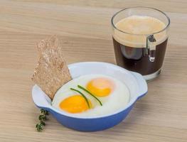 Breakfast with eggs and coffee photo