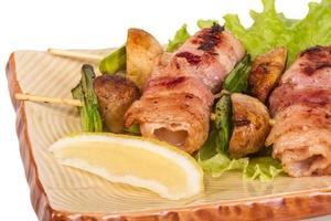 Bacon wrapped grilled Scallops with mushrooms and bacon photo