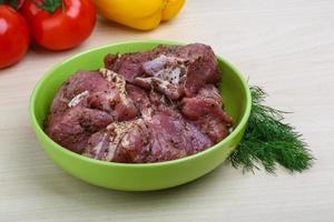 Raw marinated meat for bbq photo