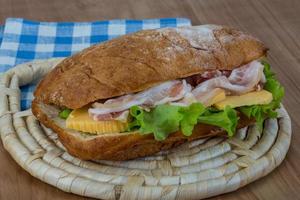 Ciabatta with cheese and bacon photo