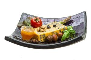 Gold cheese with mould photo